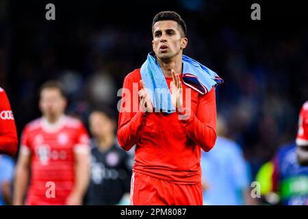Manchester, UK. 11th Apr, 2023. Soccer: Champions League, Manchester City - Bayern Munich, knockout round, quarterfinals, first leg, Etihad Stadium. Munich's Joao Pedro Cavaco Cancelo reacts unhappily after the game and thanks the fans. Credit: Tom Weller/dpa/Alamy Live News Stock Photo