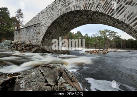 Old Bridge of Dee, also known as the Auld Brig O' Dee, original masonry road bridge crossing the river Dee at Invercauld Estate by Braemar, Cairngorms Stock Photo