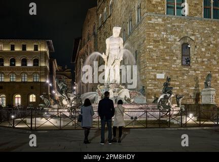 night shot of the illuminated Fountain of Neptune in the Piazza della Signoria, in front of the Palazzo Vecchio, Fontana del Nettuno, Florence Stock Photo