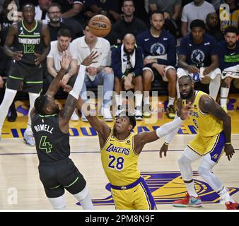 Los Angeles, United States. 11th Apr, 2023. Minnesota Timberwolves guard Jaylen Nowell (4) scores over Los Angeles Lakers forward Rui Hacimura (28) during the first half at Crypto.com Arena in Los Angeles on Tuesday, April 11, 2023. Photo by Jim Ruymen/UPI Credit: UPI/Alamy Live News Stock Photo