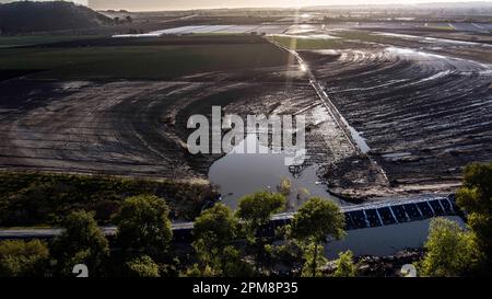 Pajaro, Calif. - March 26: The repaired Pajaro River levee on March 26, 2023. The flood ruined $330,0000 worth of strawberry and Raspberry crops. (Photo by Paul Kuroda for The Washington Post)s. Paul Kuroda/Alamy Stock Photo Stock Photo