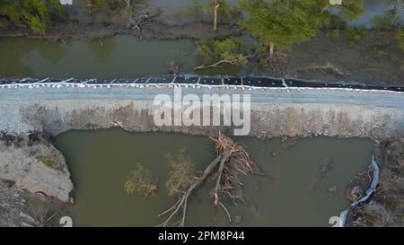 Pajaro, Calif. - March 26: The repaired Pajaro River levee on March 26, 2023. The flood ruined $330,0000 worth of strawberry and Raspberry crops. (Photo by Paul Kuroda for The Washington Post)s. Paul Kuroda/Alamy Stock Photo Stock Photo