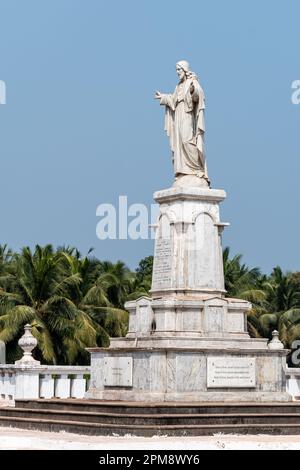 Old Goa, India - January 2023: The statue of Jesus Christ at the ancient UNESCO heritage site of the Portuguese era church of Se Cathedral in Old Goa. Stock Photo