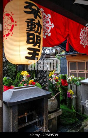 Osaka, Japan - March 21, 2023: Hozenji Temple is a Buddhist temple in the Dotonbori neighborhood of Osaka, Japan. Stock Photo