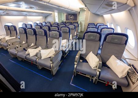 Munich, Germany. 12th Apr, 2023. View into the economy class of a Lufthansa Airbus A380 aircraft. After a three-year break, the double-decker aircraft is landing again in the Bavarian capital. Credit: Peter Kneffel/dpa/Alamy Live News Stock Photo