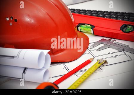 workspace engineer, blueprint apartment  and tools on desktop Stock Photo