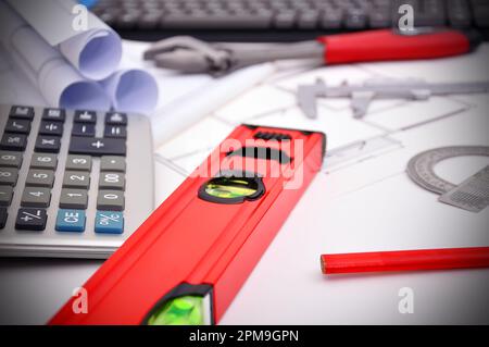 workspace engineer, line level and tools on desktop Stock Photo