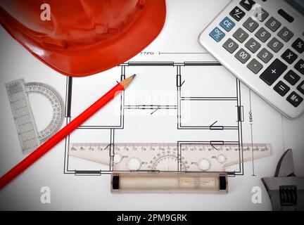 tools and  apartment  blueprint  on desktop, workspace engineer Stock Photo