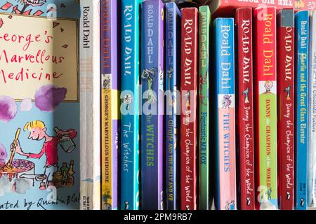 Closeup of colourful Roald Dahl book covers, spines, illustrations and artwork Stock Photo