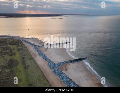 dawn over hayling island on the hampshire coast Stock Photo