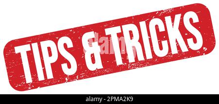 TIPS & TRICKS text written on red grungy stamp sign. Stock Photo