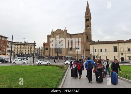 Florence, Italy. 12th Apr, 2023. Tourists seen outside Santa Maria Novella train station, Florence, Italy, April 12 2023. As during Easter holidays Italy recorded an exceptional number of tourists from all around the world, Italian authorities spoke about 'overtourism' as a phenomenon that could jeopardy art cities and naturalistic spots in the Country. (Photo by Elisa Gestri/Sipa USA) Credit: Sipa USA/Alamy Live News Stock Photo