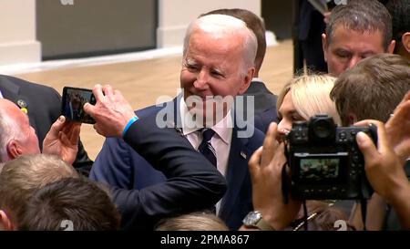 US President Joe Biden speaks with guests after his speach at Ulster University in Belfast, Northern Ireland, Wednesday, April 12, 2023. President Biden's visit marks the 25th anniversary of the Good Friday Agreement, the peace deal which ended three decades of conflict in Northern Ireland. Photo by Ulster University/UPI Credit: UPI/Alamy Live News Stock Photo