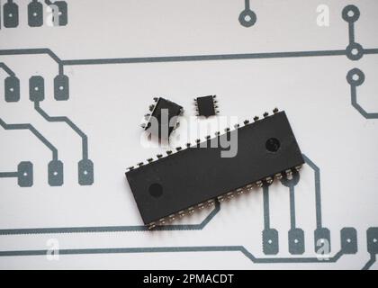 Integrated circuits and microchip on electronic schema background. Stock Photo