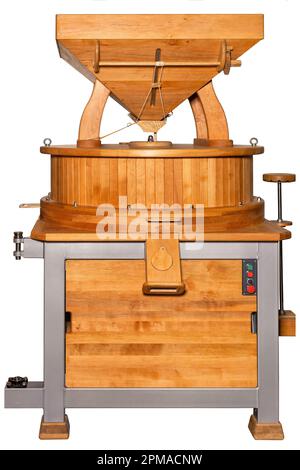 A small grinding mill of a grist mill for the production of various types of flour. Isolated on a white background. Stock Photo
