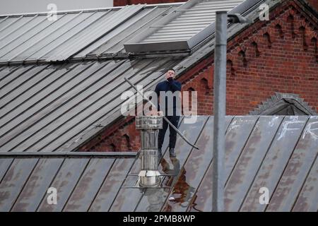 An Inmate makes it up on the roof at HM Prison Manchester aka Strangeways, Manchester, United Kingdom, 12th April 2023  (Photo by Ben Roberts/News Images) Stock Photo