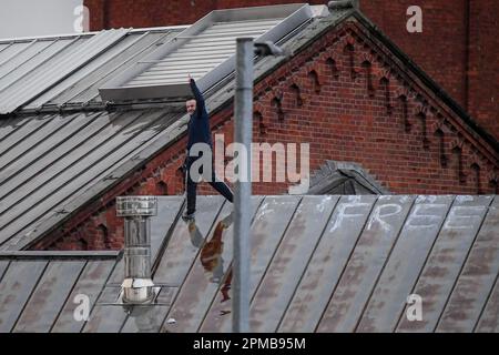 An Inmate makes it up on the roof at HM Prison Manchester aka Strangeways, Manchester, United Kingdom, 12th April 2023  (Photo by Ben Roberts/News Images) Stock Photo