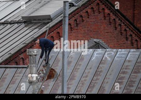 An Inmate makes it up on the roof at HM Prison Manchester aka Strangeways, Manchester, United Kingdom, 12th April 2023  (Photo by Ben Roberts/News Images) Stock Photo