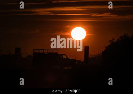 sunset on Highway 15 as it passes through the Yaquis towns between the municipalities of Empalme and Ciudad Obregon in the southern Mexican state of Sonora, Mexico. © (© Photo by Luis Gutierrez / Norte Photo)  atardecer en la carretera 15 a su paso por los pueblos Yaquis entre los municipios de  Empalme y Ciudad Obregon  sur del estado mexicano de Sonora, Mexico . © (© Photo by LuisGutierrez / Norte Photo) Stock Photo