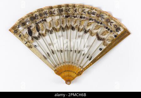 Pleated Fan; silk net leaf embroidered with gilt spangles and steel pieces, pierced horn sticks with gilt piqués Stock Photo