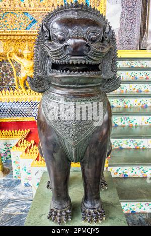 Bronze guardian lion at Wat Phra Kaew in Bangkok, Thailand Stock Photo