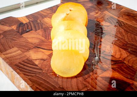 Close-up of a Mirabelle plum, a small yellow plum that is sweet in its taste and tropical as well as exotic. Stock Photo