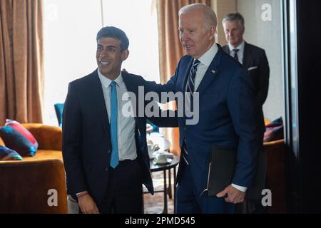 (230412) -- BELFAST, April 12, 2023 (Xinhua) -- British Prime Minister Rishi Sunak (L, Front) meets with U.S. President Joe Biden (R, Front) in Belfast, Northern Ireland, the United Kingdom, on April 12, 2023. During his visit to Belfast on Wednesday, U.S. President Joe Biden called for the restoration of the power-sharing government in Northern Ireland. However, analysts do not expect his plea to lead to significant change. (Simon Walker/No 10 Downing Street/Handout via Xinhua) Stock Photo