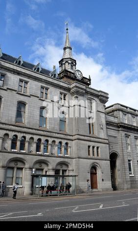 ABERDEEN, SCOTLAND - 11 APRIL 2023: The tolbooth was a 17th and 18th century jail in the city and the original sandstone can be seen peeking out from Stock Photo