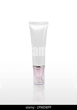 Cosmetic cream bottle isolated on white background with reflection, clipping path included. Stock Photo