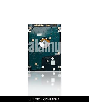 Close up back of hard disk drive 2.5 inch isolated on white background with reflection, clipping path included, computer parts concept. Stock Photo