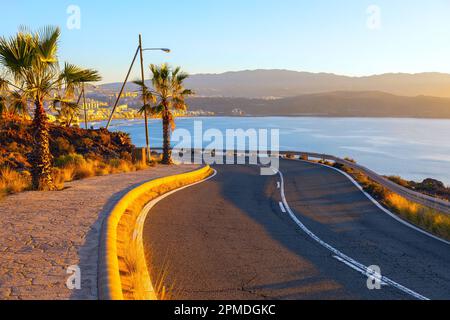 Winding road along the ocean . Driving way in Las Palmas Gran Canaria Stock Photo