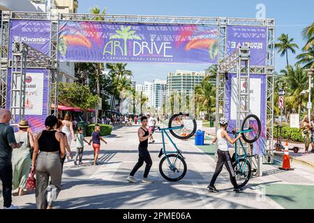 Miami Beach Florida,Miami Beach Live Carnaval Experience,Ocean Art Drive,man men male,woman women lady female,adult adults,resident residents,couple c Stock Photo