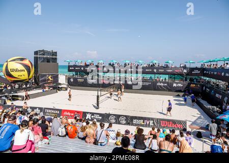 Miami Beach Florida,Miami Beach Live Carnaval Experience,Spring Break Breakers,volleyball tournament players playing game match,fans audience watching Stock Photo