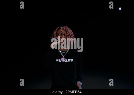 Atlanta Rapper SoFaygo perform on stage at Scotiabank Arena in Toronto with pink hair, a diamond watch, jewel medallion and a Mickey Mouse neck tattoo Stock Photo