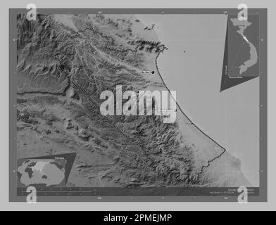 Quang Binh, province of Vietnam. Grayscale elevation map with lakes and rivers. Locations and names of major cities of the region. Corner auxiliary lo Stock Photo