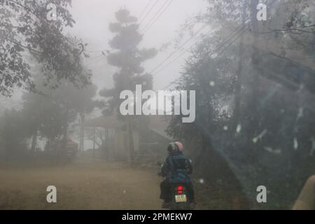 traffic on a misty Rural road Photographed near Sa Pa Northwestern Vietnam Stock Photo