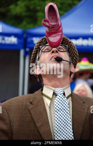 Street entertainer Maynard flip flap performing at the Levens Hall Chilli Festival in 2010 Stock Photo