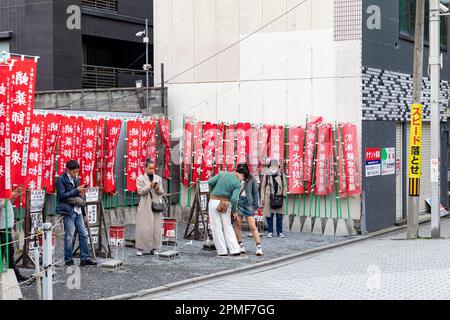 Kyoto Japan, outdoor area reserved for cigarette smokers smoking, near Nishiki market area in downtown Kyoto,Japan,Asia Stock Photo