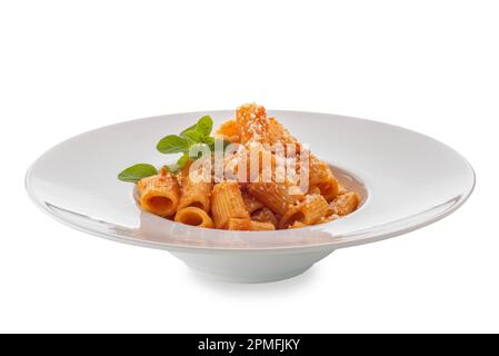 Mezze maniche macaroni with red tomato sauce and grated parmesan cheese and marjoram leaves in white plate, isolated on white, clipping path included Stock Photo