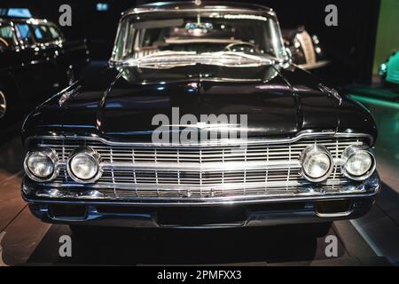 Governmental USSR limousine ZIL-111G produced by the Soviet car manufacturer ZiL in 1958-1967. Vintage Cars Exhibition at Riga Motor Museum. Riga, Latvia - March 12, 2023. Stock Photo