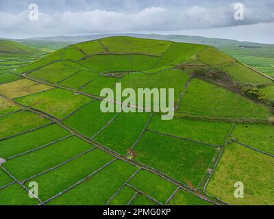 Terceira Aerial View. Dona Joana Volcanic Peak. Beautiful Green Terceira Island Landscape near Serra do Cume, Azores Archipelago, in Atlantic Ocean. Stock Photo