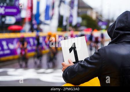 Overijse, Belgium. April 12, 2023.  Illustration picture shows the board with the number one showing at the finish line which indicates the last round @ the BRABANTSE PIJL women cycling race, 141,2 km from LENNIK to OVERIJSE, Wednesday April 12th 2023. PHOTO SPORTPIX | Thijs Wintein Stock Photo