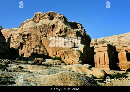 Block tomb BD 9 Petra city Nabataean caravan-city rock-cut façades Jordan carved sandstone rock desert. Stock Photo