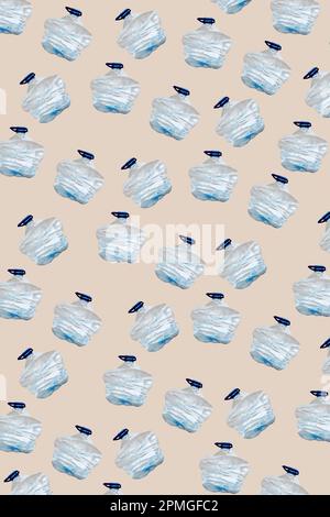 some smashed plastic bottles arranged in different lines forming a pattern on a beige background Stock Photo