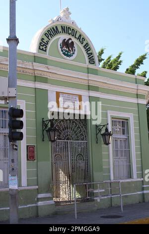 MERIDA, MEXICO - OCTOBER 28, 2016 close up of traditional green painted buildings in the city centre Stock Photo