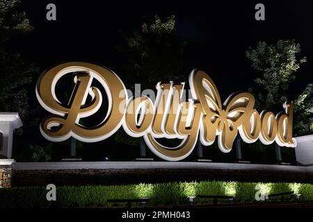 The entrance to Dollywood with the amusement park logo. Dollywood is Dolly Parton's famous amusement park located in the Smoky Mountains. Stock Photo