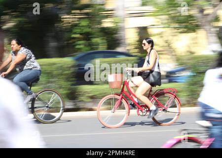 MERIDA, MEXICO - OCTOBER 30, 2016 Sunday cycling on the  Paseo de Montejo - girl with basket Stock Photo