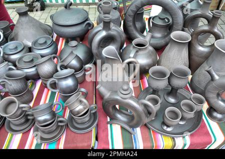 A variety of pottery made by folk craftsmen from clay. Stock Photo