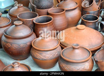 A variety of pottery made by folk craftsmen from clay. Stock Photo