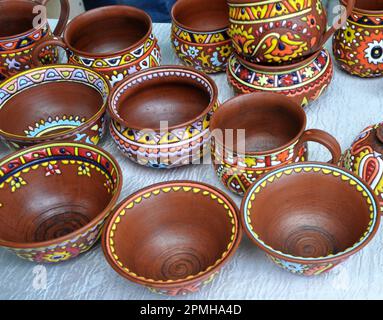 A variety of pottery made by folk craftsmen from clay. Stock Photo